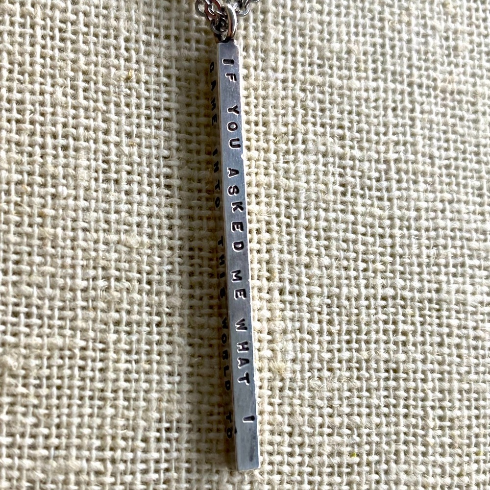 Sterling silver bar pendant inscribed with great quote.